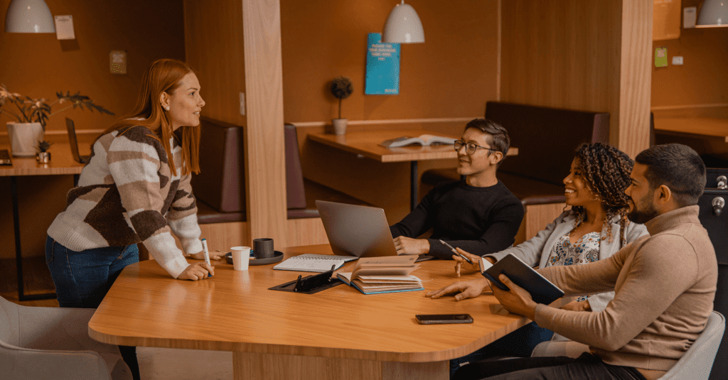 Image of colleagues illustrating a insurance compliance meeting
